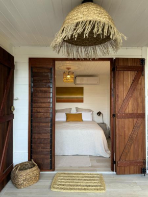 Les Cabanes cosy à 2 pas du lagon - charme et confort